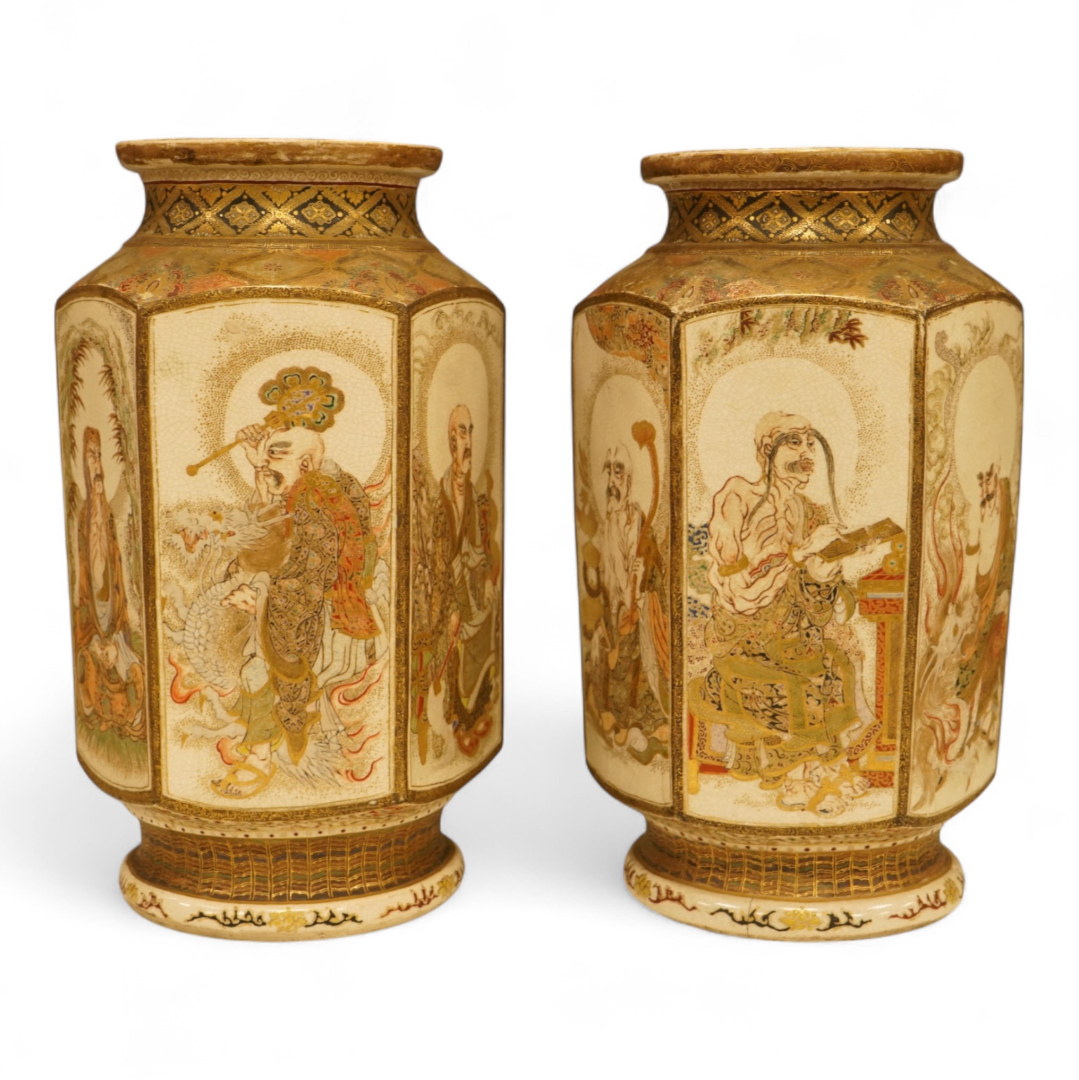 A pair of Japanese Satsuma 'rakan' vases, Meiji period, 26cm high